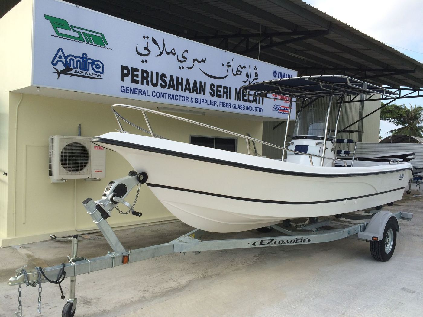 AMIRA fiberglass boat on trailer